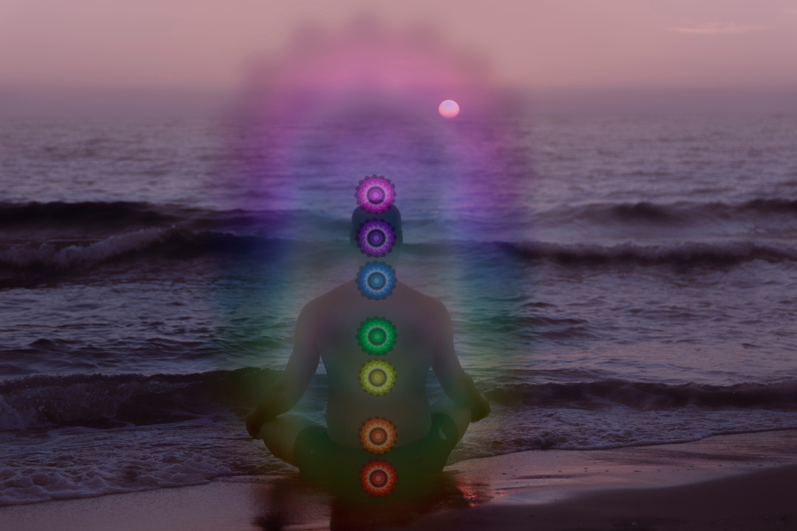 Human energy body with aura and chakras